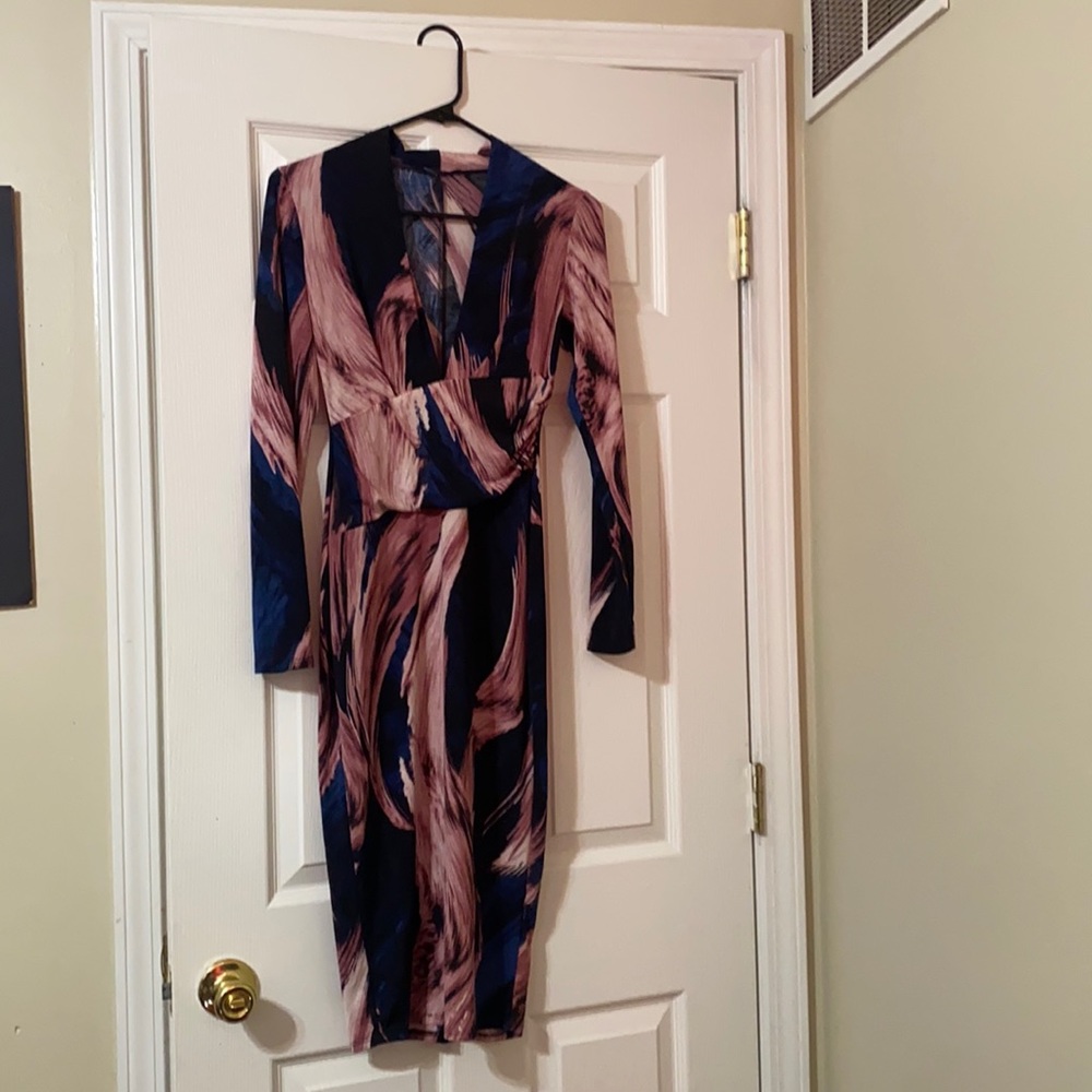 Fitted long sleeve fashion nova dress with beautiful colors.